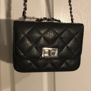 Quilted black crossbody handbag